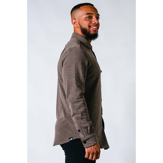 Side view of the Belong Designs Men's Sherman Fleece Button Up in Brown showing the model wearing it against a white background.