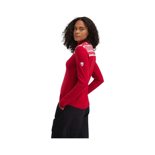 Side view of the Dale Of Norway Women's Cortina Basic Sweater-SAMPLE in RaspOffWhite showing the shoulder logo and white background.