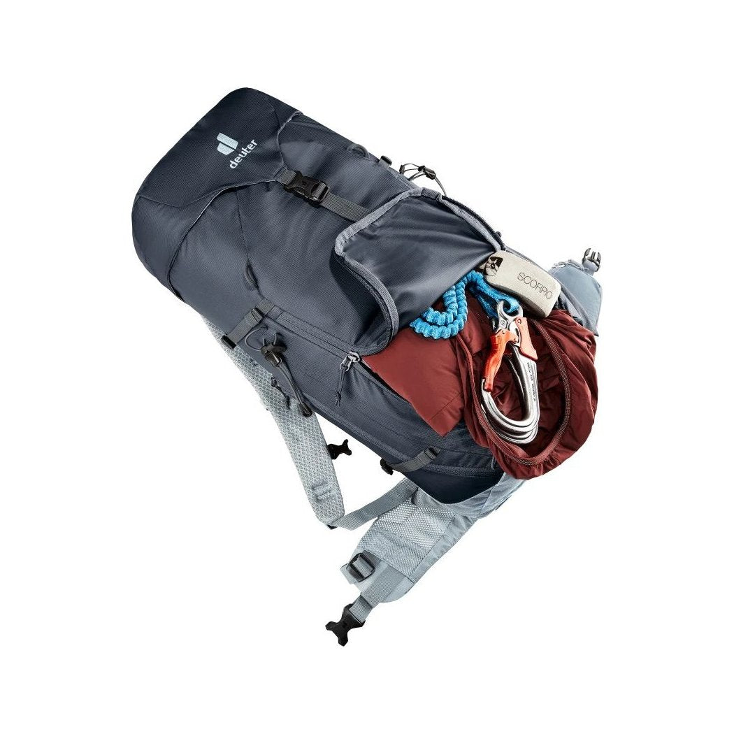 Side view of the Deuter Trail 30 in Black Shale showing the open main compartment with climbing gear inside against a white background.