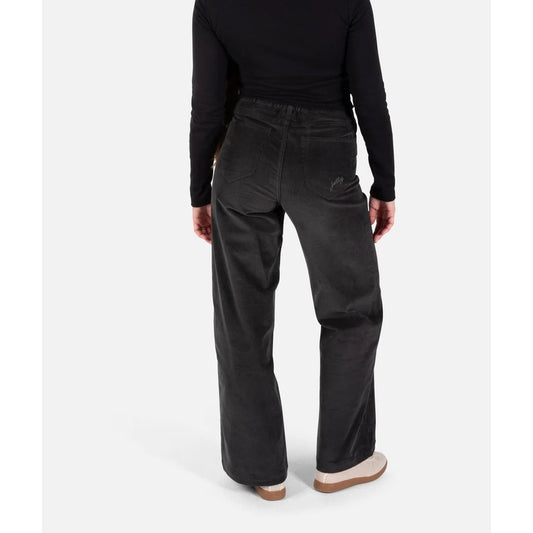 Back view of the Jetty Womens Whaler Corduroy Wide Leg Pants in Charcoal on a model against a white background.