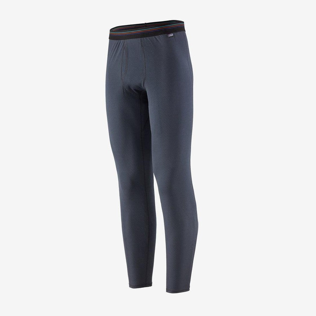 Side view of the Patagonia Men's Capilene Midweight Bottoms in Black against a white background.