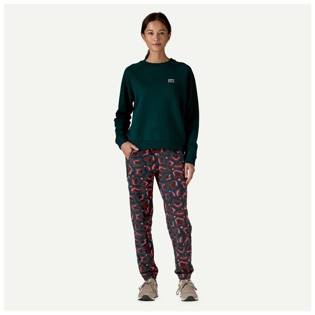 A front view of the Patagonia Women's Micro D Joggers in Ellwood Green worn by a model against a plain white background.