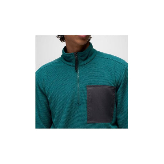 Close-up of the Prana Mens Stretch Zion Fleece 1/4 Zip-SAMPLE in Blue Coral showing the charcoal pocket and high collar on a model.