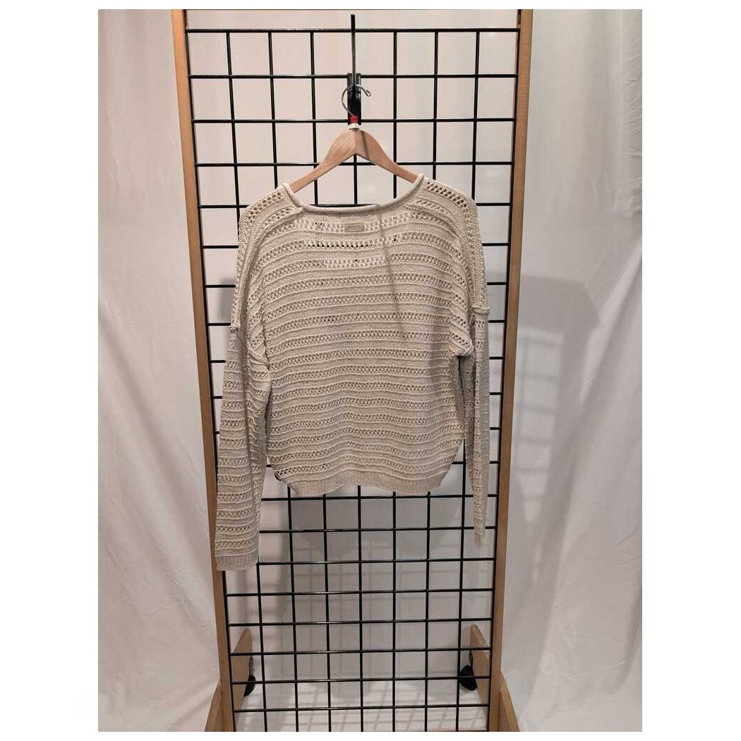 Front view of the Prana Womens Malibu Lagoon Sweater-SAMPLE in Stone Marl hanging on a wooden hanger against a grid background.