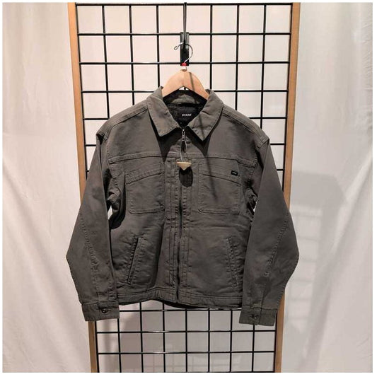 Front view of the Prana Womens Rock Ridge Jacket-SAMPLE in Thyme hanging on a wooden hanger against a grid background.
