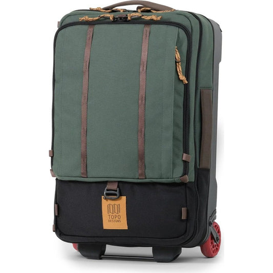 Front view of the Topo Designs Global Travel Bag Roller in Navy/Sahara with red wheels and brown straps.