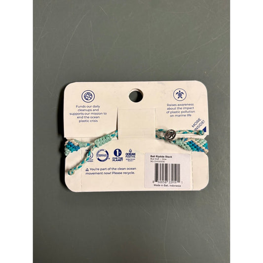 Back of the 4Ocean Riptide Braided in CopperCoralBlue showing the braided bracelet and product info on a gray background.