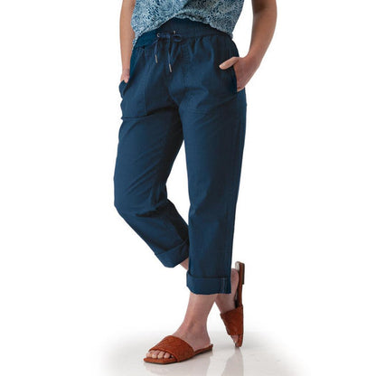 Side view of the Aventura Women's Ballard Ankle Pant in Botanical Green showing the drawstring waist and pockets against a white background.