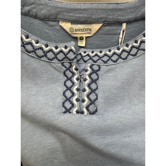 Close-up of the Aventura Women's Bronte Top in Faded Demin showing the embroidered neckline and button placket.