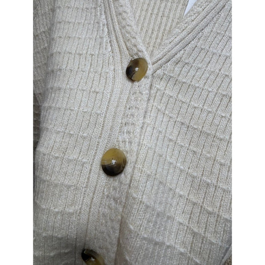 Close-up of the Aventura Women's Snug Hollow Cardigan in HeatheredOatmea showing its textured knit and two-tone buttons.