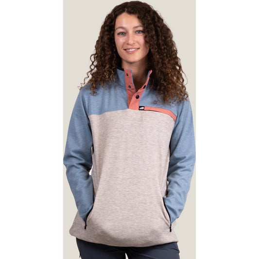 Front view of the Belong Designs Women's Powell Fleece Pullover in Vintage Dusty Blue with a model wearing it against a light background.