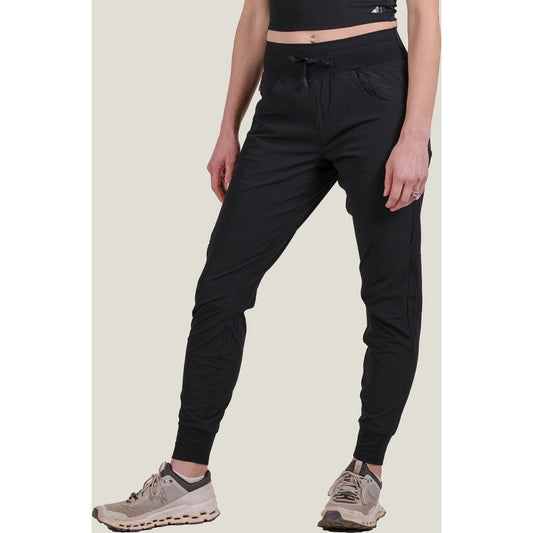 Front view of the Belong Designs Women's Rocky Mountain Joggers in Black on a model wearing sneakers against a light background.