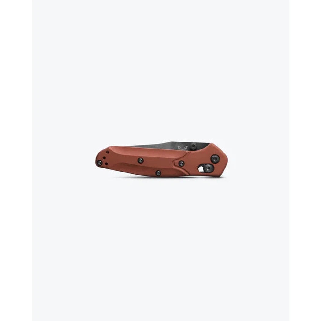 Side view of the Benchmade Mini Osborne with a brown handle and black accents against a plain white background.