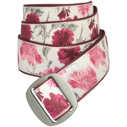 A close-up of the Bison 38mm Manzo Ribbon Belt in Coast Desert, showing the floral pattern and metal buckle against a white background.