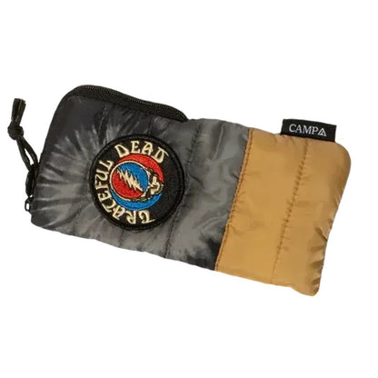 A side view of the Camp Eyewear Crag: Grateful Dead Stealie Edition showing the black and tan colorway with the Grateful Dead logo patch against a white background.