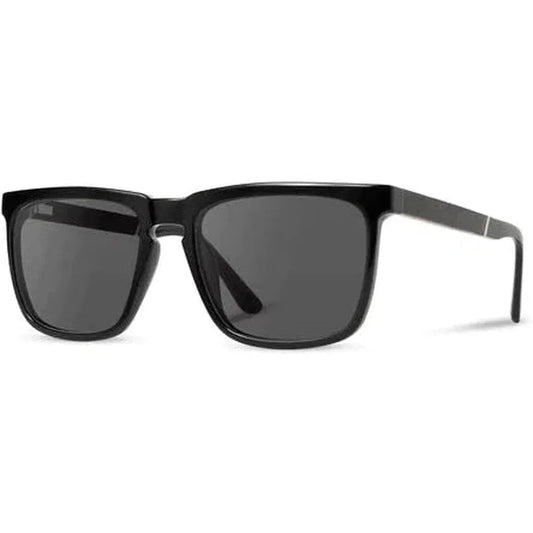 Side view of the Camp Eyewear Ridge sunglasses in Black // Ebony with dark lenses against a white background.