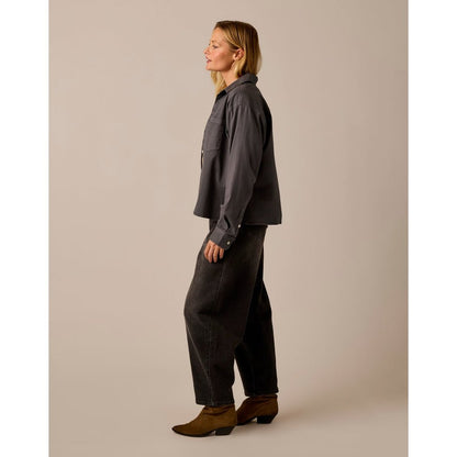 Side view of the Carve Designs Claire Twill Shirt in Washed Black on a model against a neutral background.
