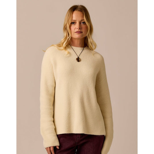 Front view of the Carve Designs Olivia Plush Sweater in Cream on a model against a neutral background.