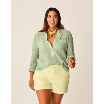 A woman wearing the Carve Designs Women's Dylan Gauze Shirt in Haze Print stands against a plain background.