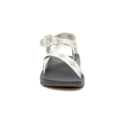 Front view of the Chaco Women's Z1 Classic sandals in Oculi Sand with crisscross straps and a charcoal-colored footbed against a white background.