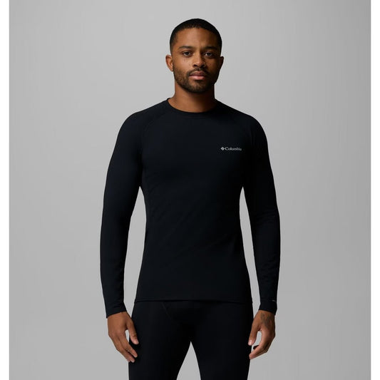 Front view of the Columbia Sportswear Men's Omni-Heat Infinity Knit LS Crew in 010 Black on a model against a gray background.