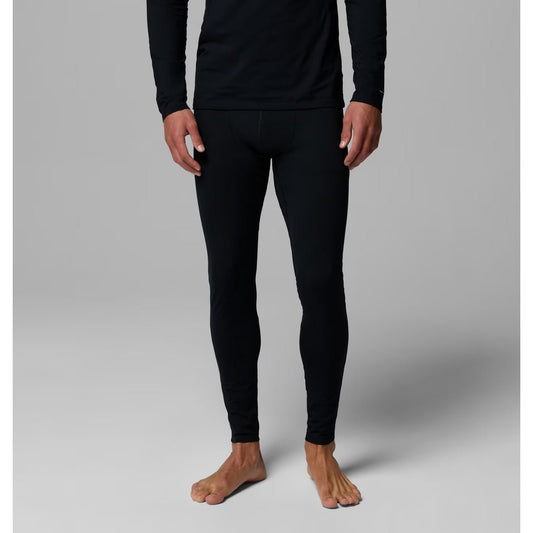 Front view of the Columbia Sportswear Men's Omni-Heat Infinity Tight in 010 Black on a barefoot model against a gray background.