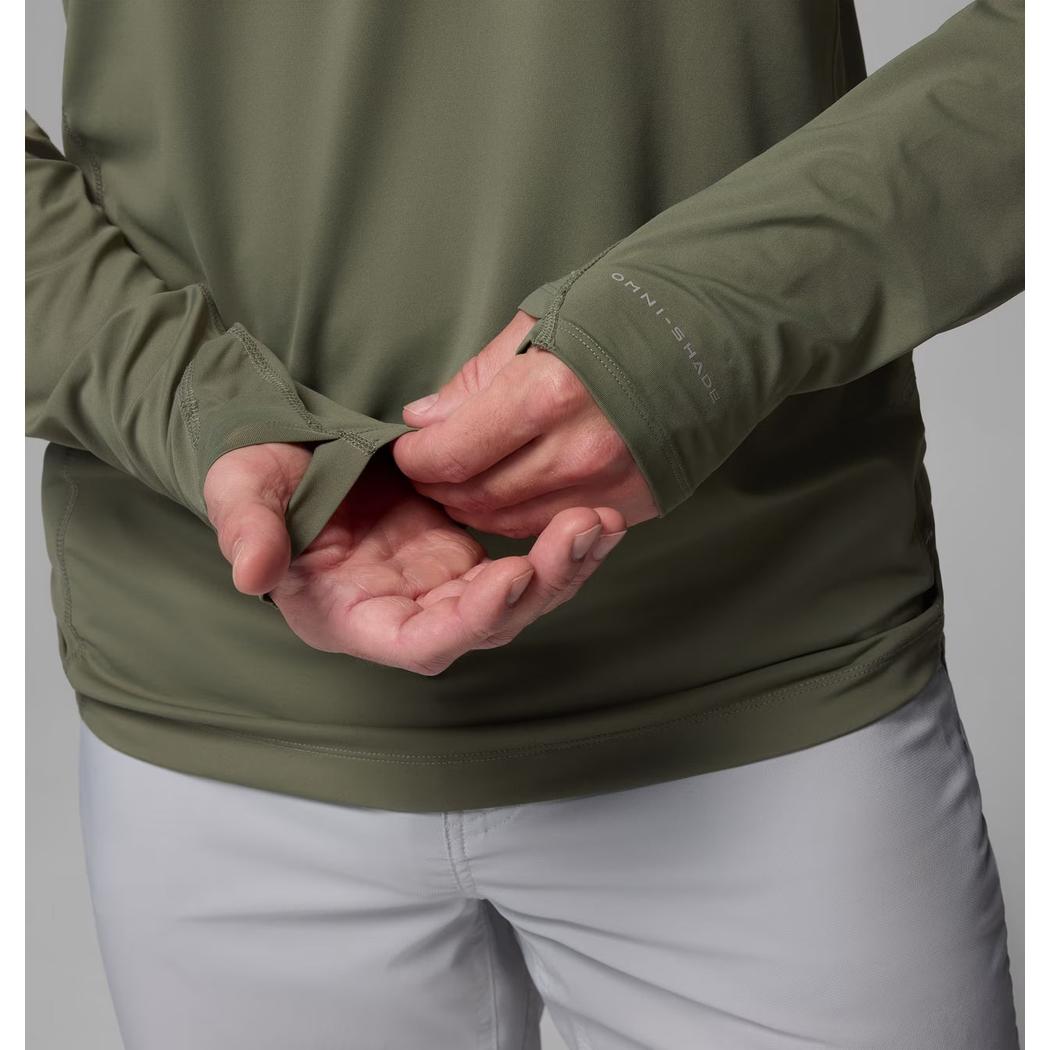 A close-up of a man wearing the Columbia Sportswear Men's Shoaltech Hoodie in Cypress, showing the cuffs and a neutral background.
