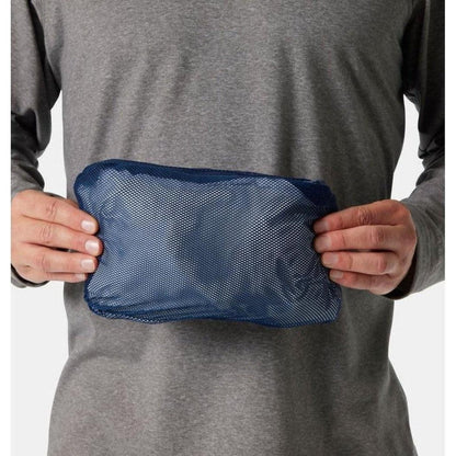 A man in a gray shirt holds a Collegiate Navy Columbia Watertight II Jacket against his torso, showing the mesh pocket and front view.