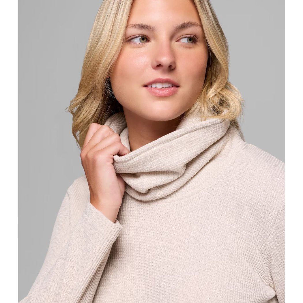 Front view of the Columbia Sportswear Women's Holly Hideaway Waffle Cowl Neck Pullover in Dark Stone with a model wearing it against a gray background.