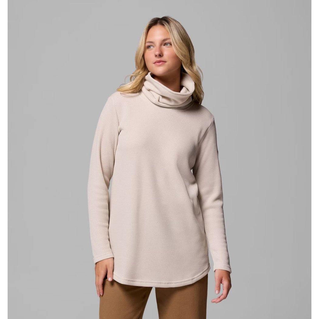 Front view of the Columbia Sportswear Women's Holly Hideaway Waffle Cowl Neck Pullover in Dark Stone on a model against a gray background.