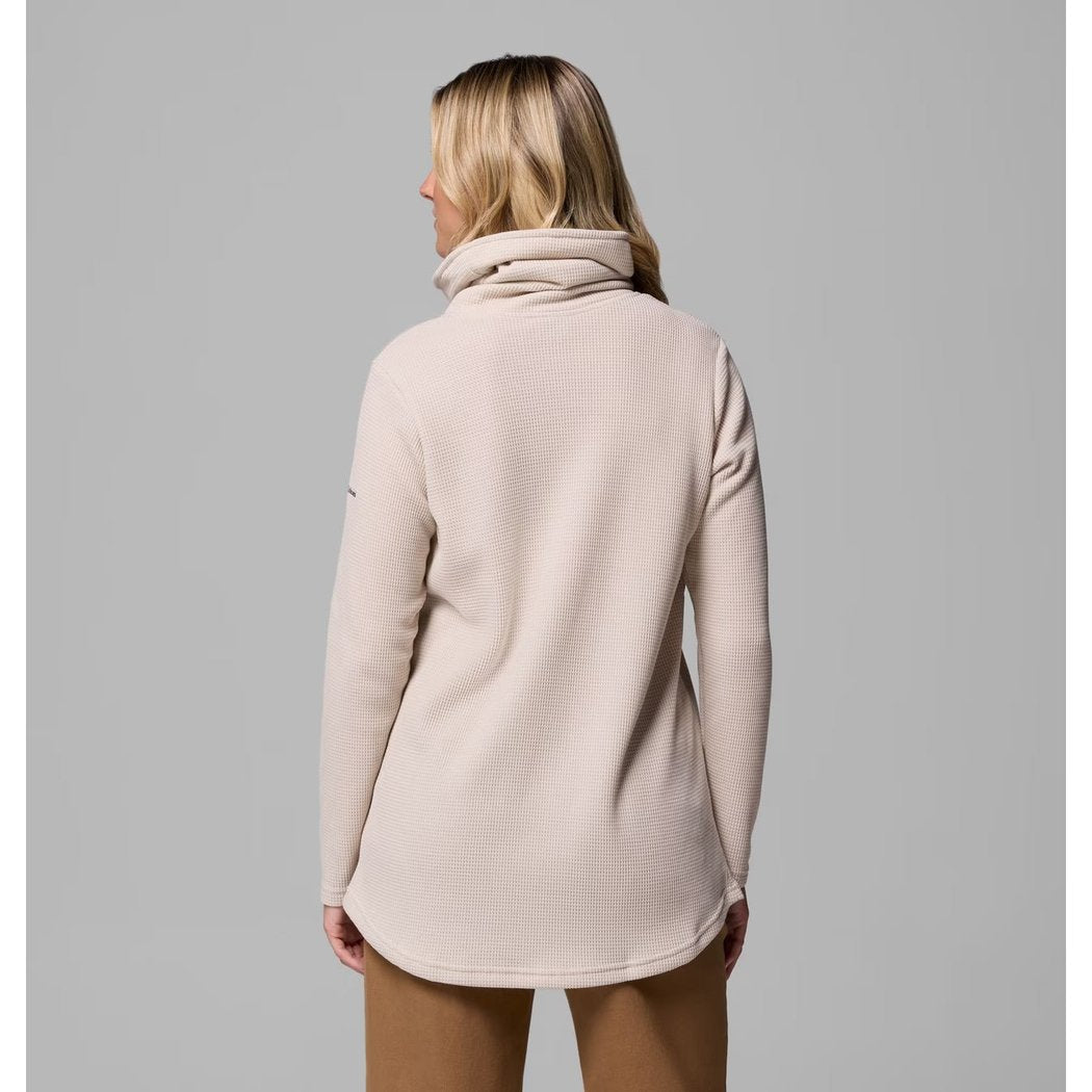 Back view of the Columbia Sportswear Women's Holly Hideaway Waffle Cowl Neck Pullover in Dark Stone on a model against a gray background.