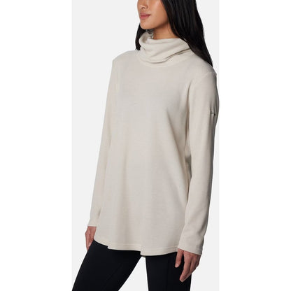 Side view of the Columbia Sportswear Women's Holly Hideaway Waffle Cowl Neck Pullover in Dark Stone on a model against a white background.