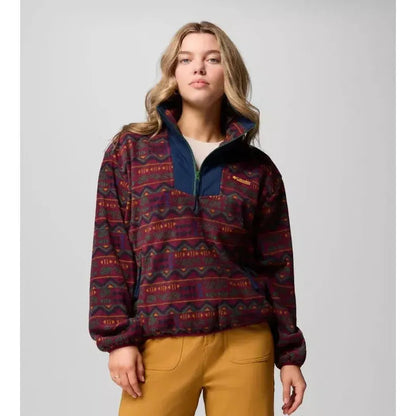 A front view of the Columbia Sportswear Women's Sequoia Grove Printed Half Zip in Rich Wine Horizons on a model wearing tan pants against a light gray background.