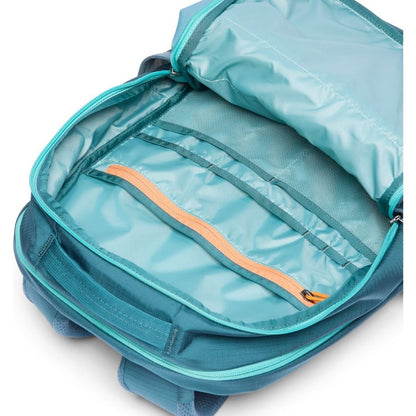 Top-down view of the Cotopaxi Allpa 26L Daypack in Blue Spruce/Abyss showing its open main compartment with an orange zipper and mesh pockets.