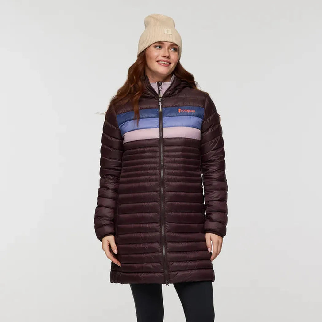 A front view of the Cotopaxi Women's Fuego Down Parka in Coffee Stripes on a model against a plain white background.