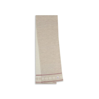 A folded Dale Of Norway Garmisch Scarf-SAMPLE in SandOffWht with a patterned border and small tag, against a white background.
