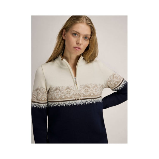A model wears the Dale Of Norway Moritz Fem Sweater-SAMPLE with a cream, brown, and navy color scheme against a plain background.