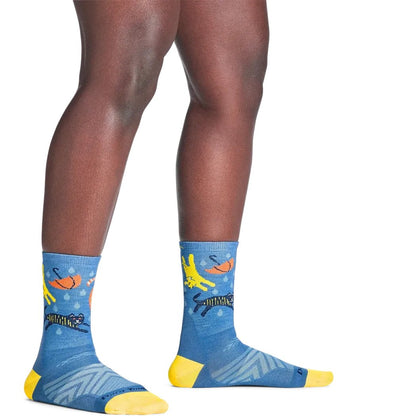 Side view of Darn Tough Women's Ruff Weather Micro Crew Ultra-Lightweight Running Socks in Storm showing the yellow toe and heel on a model against a white background.