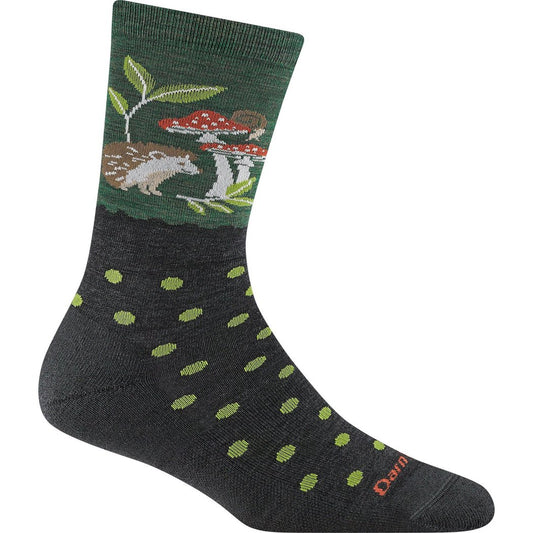 Front view of the Darn Tough Women's Wild Life Crew Lightweight with Cushion in Forest showing a hedgehog and mushrooms on the upper section with green dots on the lower.