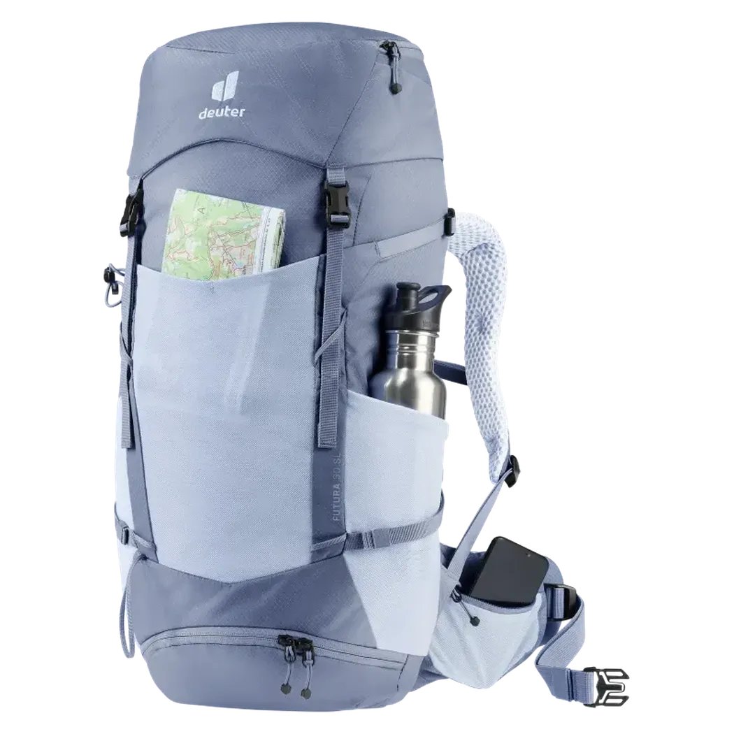 Side view of the Deuter Futura 30 SL in Polar Bluejay showing the front pocket with a map and water bottle against a white background.