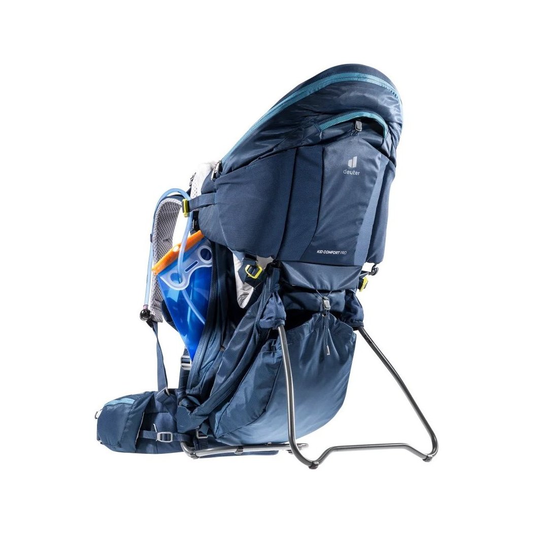 Side view of the Deuter Kid Comfort Pro in Midnight showing the frame and blue hydration reservoir against a white background.