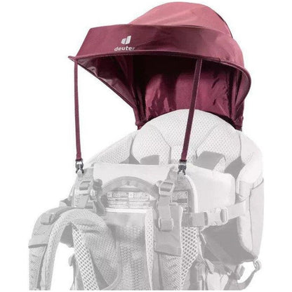 A maroon Deuter Kid Comfort child carrier backpack with a sunshade, shown from the front against a white background.