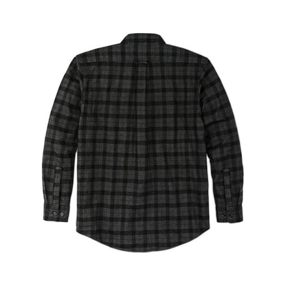 Back view of the Filson Men's Alaskan Guide Shirt in Heath Blk Plaid showing the long sleeves and button cuffs.