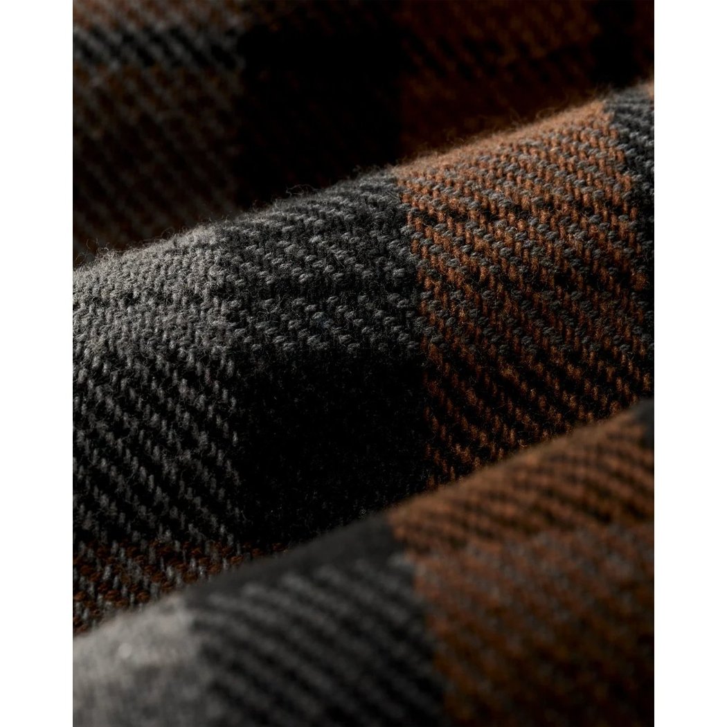 Close-up of the Filson Men's Vintage Flannel Work Shirt in Brown showing its textured plaid fabric.