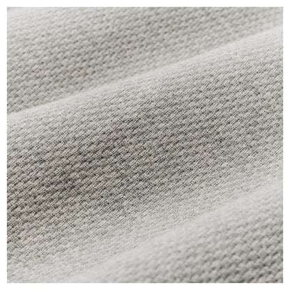 Close-up of the Filson Men's Waffle Knit Thermal Crewneck in Charcoal showing its textured knit fabric.