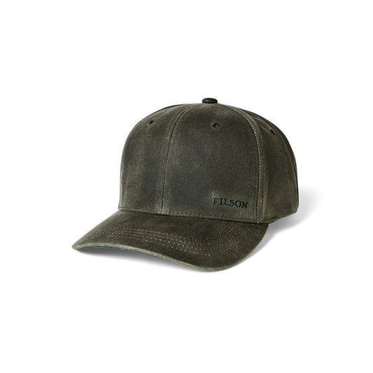 Front view of the Filson Waxed Logger Cap in Otter Green showing the curved brim and embroidered logo against a white background.