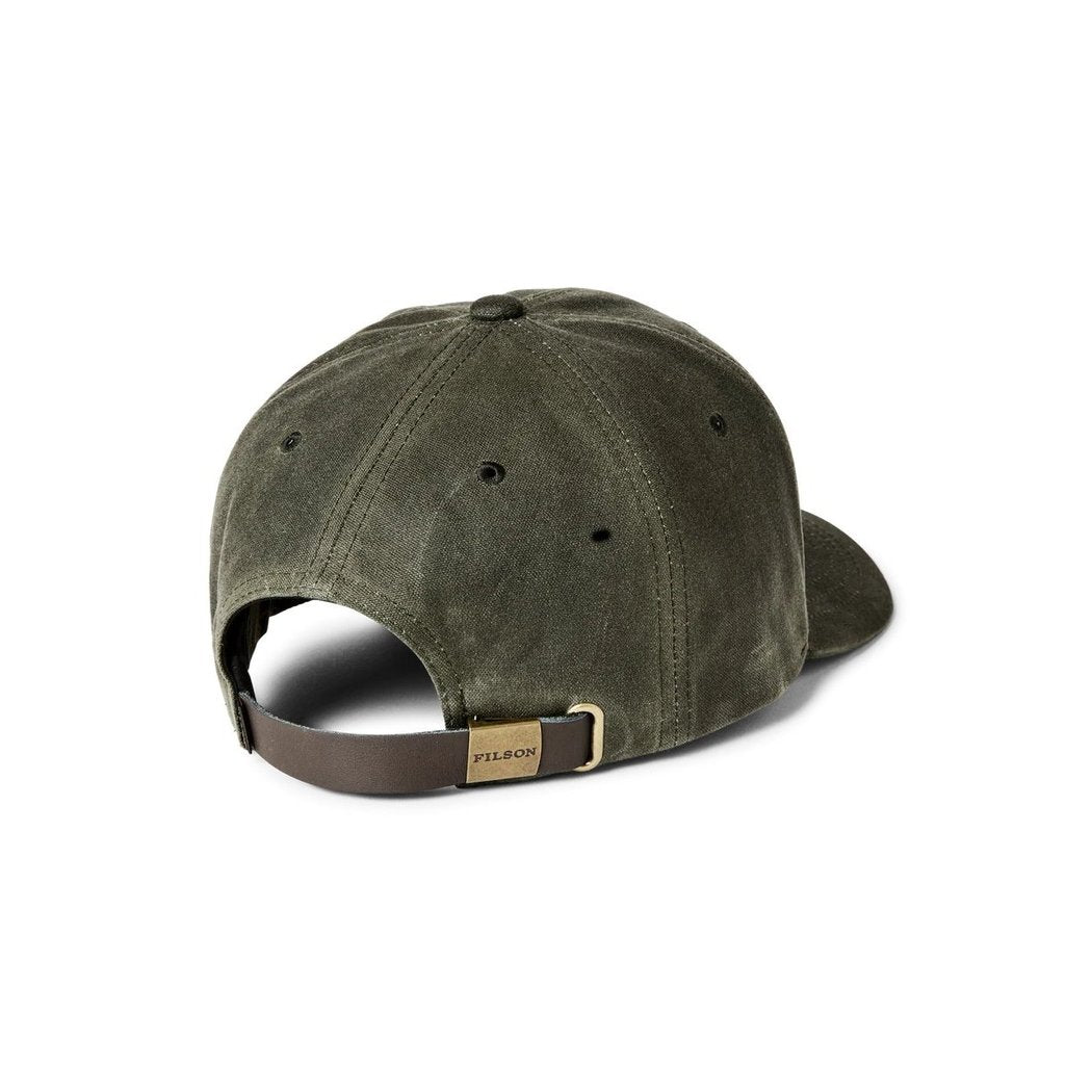 Back view of the Filson Waxed Logger Cap in Otter Green showing the brown leather strap and metal buckle against a white background.