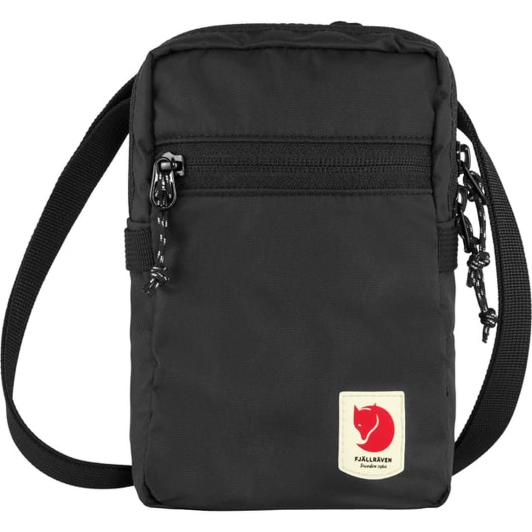A front view of the Fjallraven High Coast Pocket in Black showing the zippered pocket and adjustable strap against a white background.