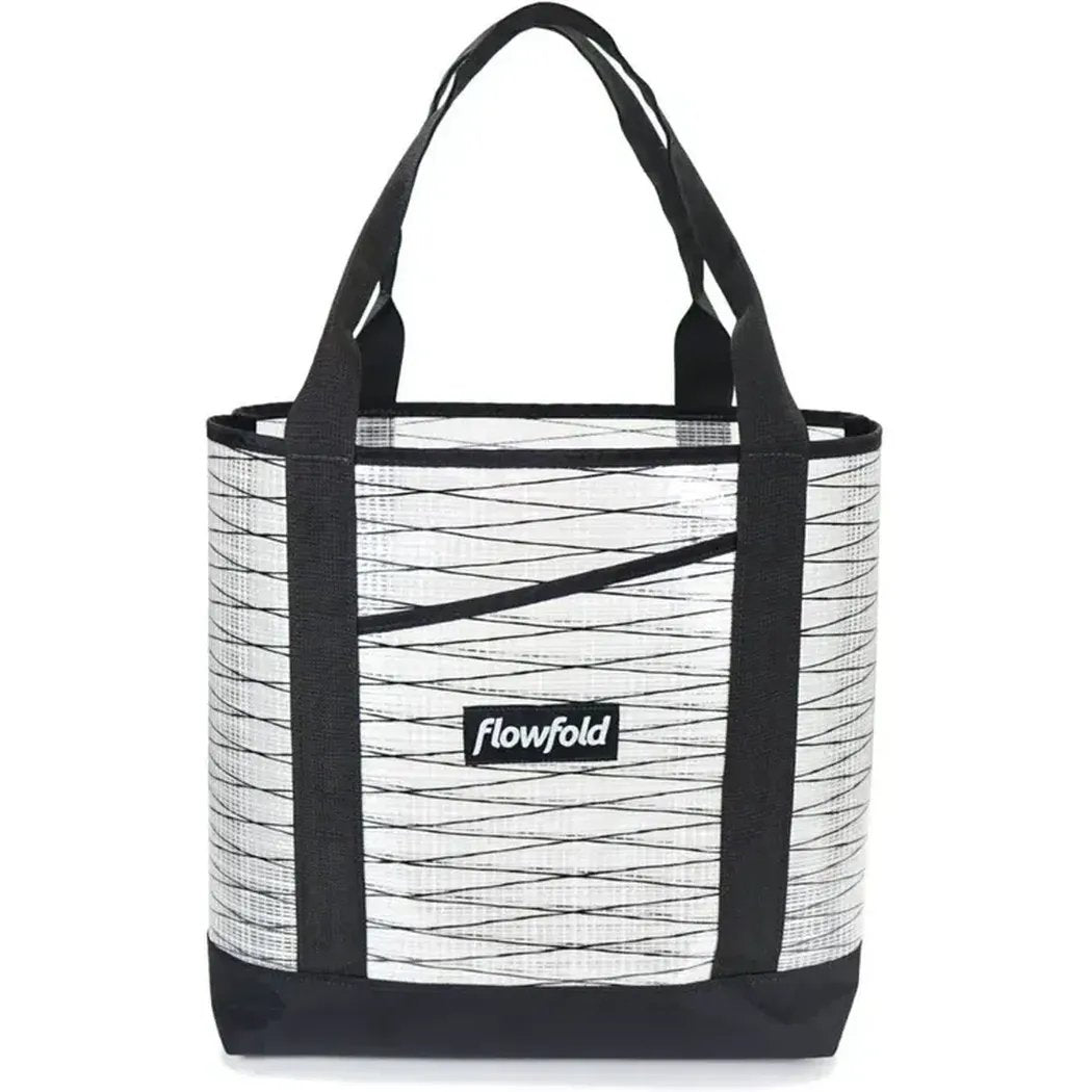 A front view of the Flowfold Recycled Sailcloth Porter Tote in Grey with black straps and a black bottom.