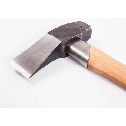 A close-up of the Gransfors Bruk Splitting Maul with a wooden handle and metal head, photographed against a white background.